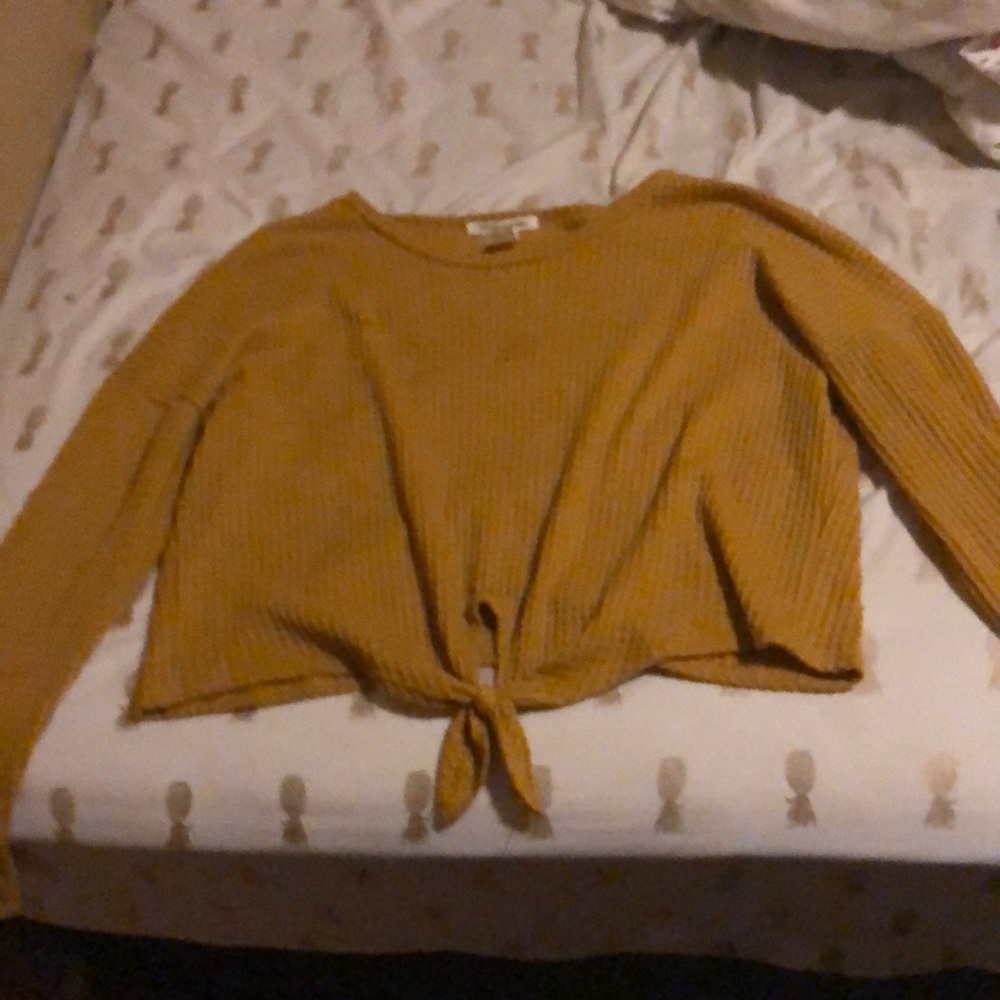 A cropped sweater cut 14.27